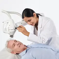 Woman Operating IG-SRT Machine